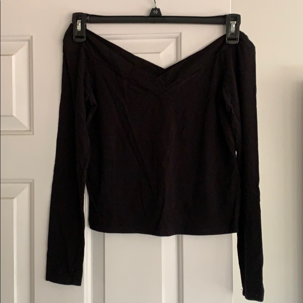 Black long sleeved top.